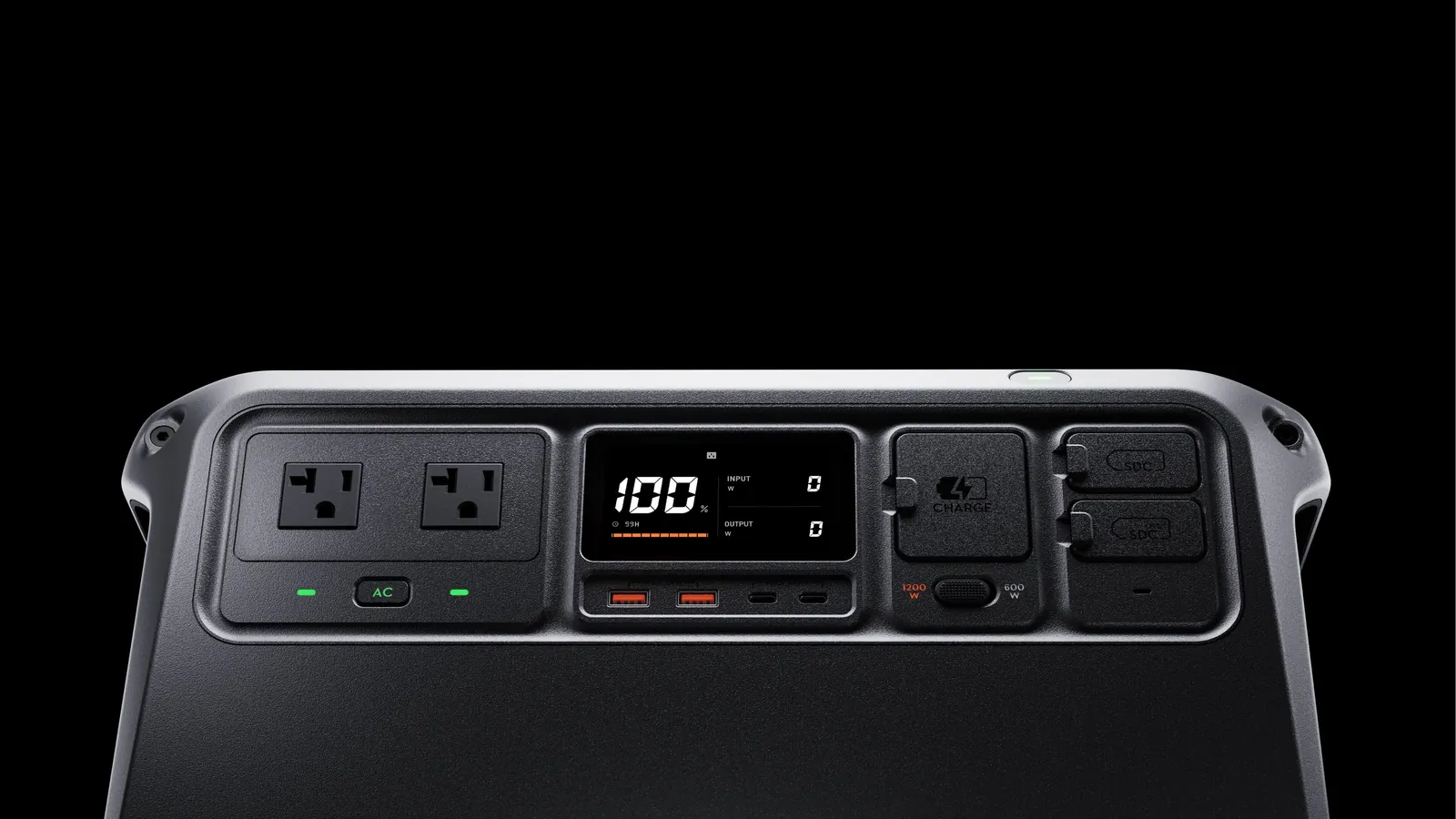 DJI Power 1000 front panel close-up showing two AC outlets, display at 100 percent, USB ports and SDC ports